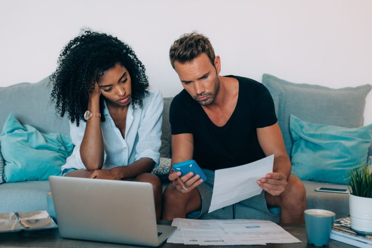 Confused-Couple-Filing-Out-Forms